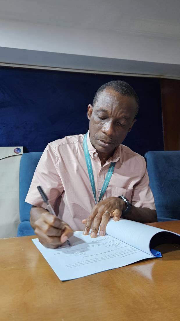 Professor Adebayo Shittu signs the Memorandum of Understanding