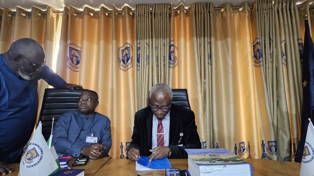 The Vice-Chancellor reviews the MoU document