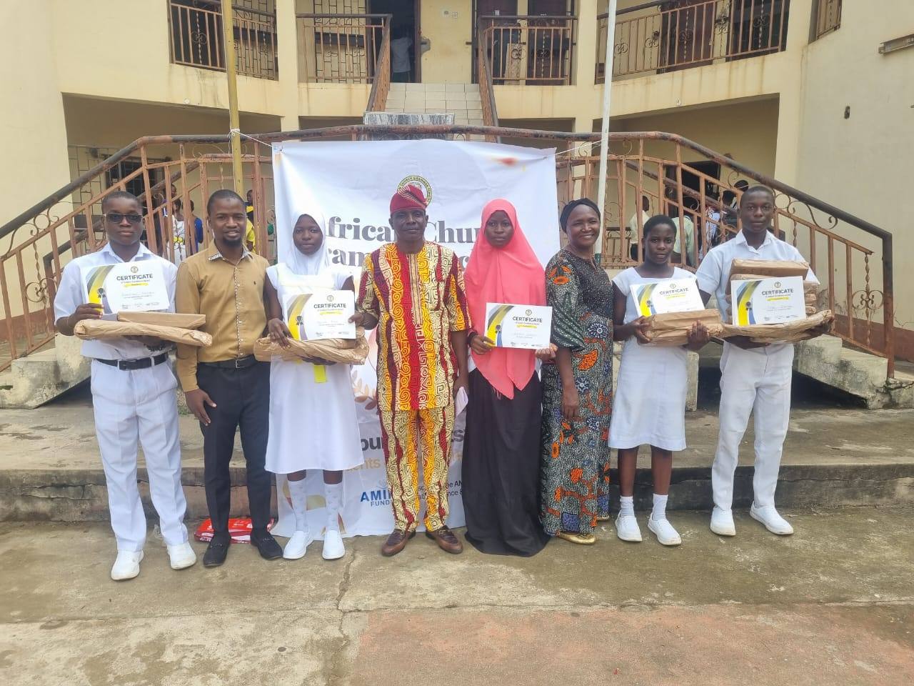 Prize winners and school staff at African Church Grammar School